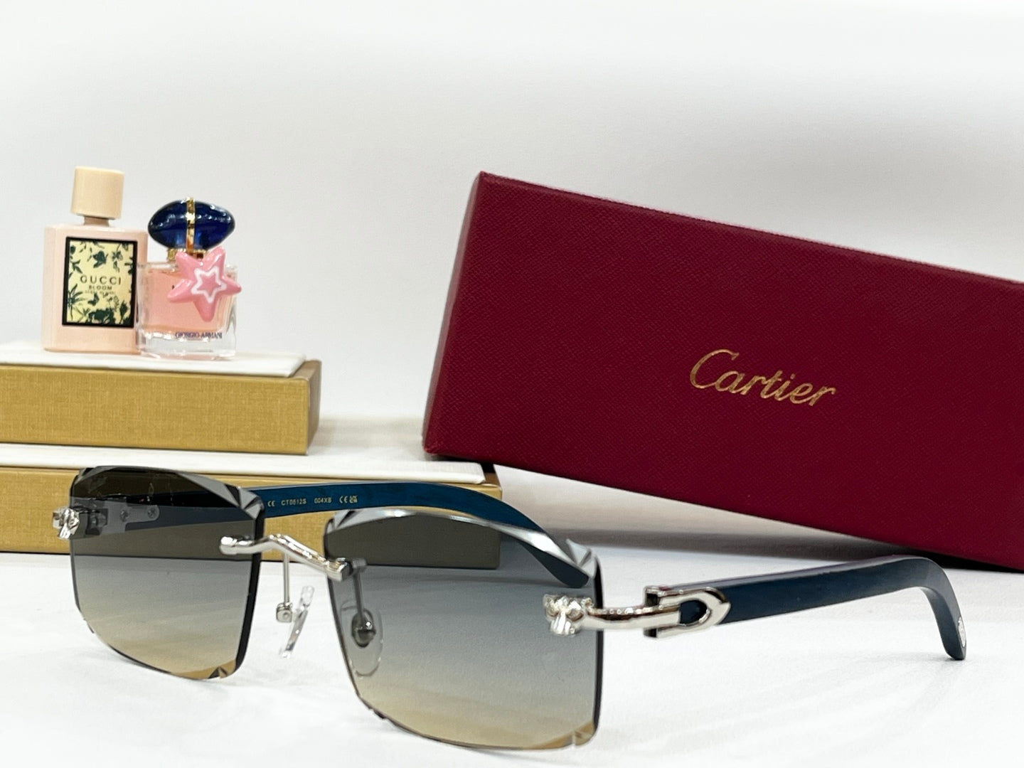C DE RIMLESS RECTANGULAR FRAME SUNGLASSES CT0612S IN METAL